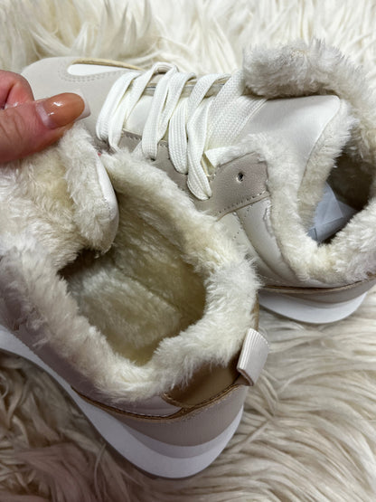 White and beige fleeced lined trainers