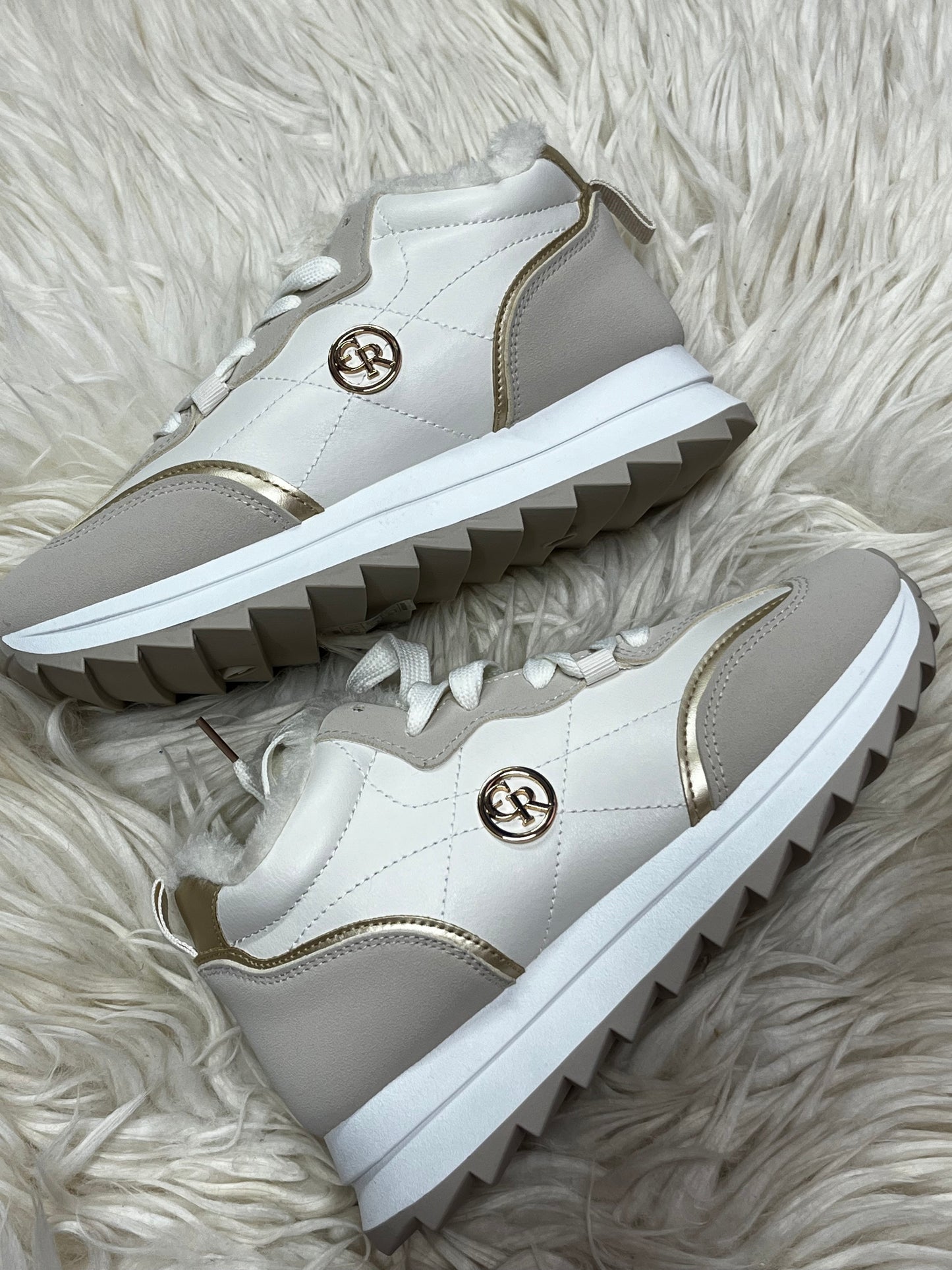 White and beige fleeced lined trainers