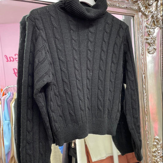 Black cable knitted turtle neck jumper